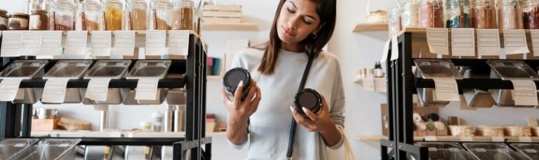 woman comparing products in a store