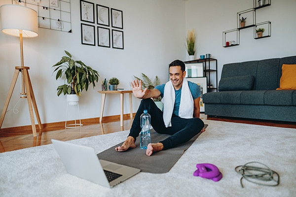 man doing workout in living room