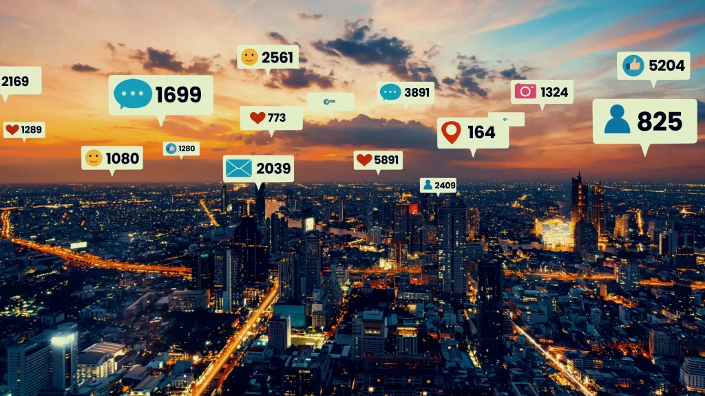 Social media and marketing icons floating over a cityscape to represent marketing engagement