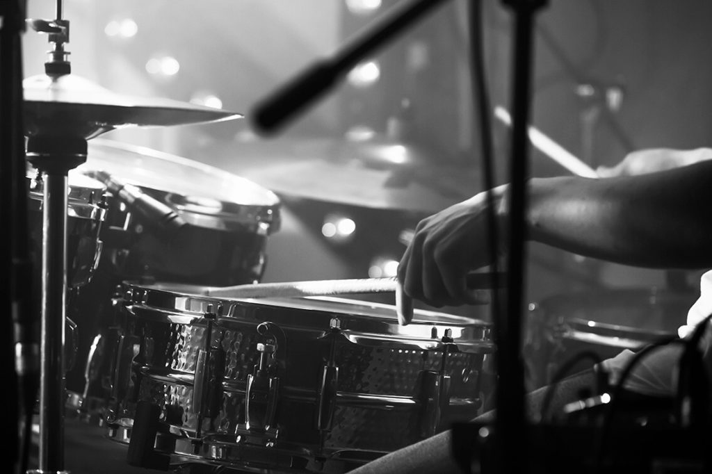 Black and white view of drum set