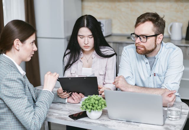 a consultant talks to a couple