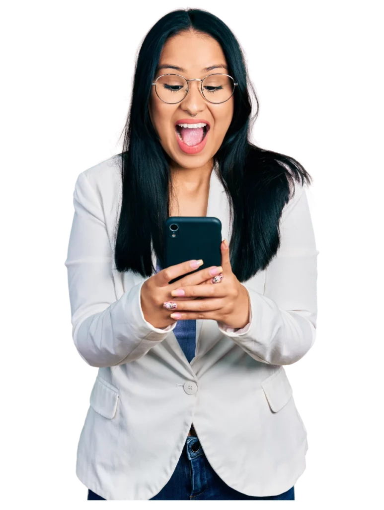 Image of a girl looking at her phone happy